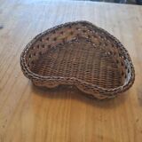 Small wicker basket in the shape of a heart.