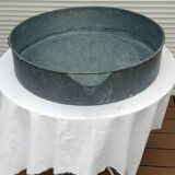 Large vintage industrial zinc basin with spout.