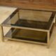 Hollywood Regency coffee table in smoked glass with mirrored framing from the 1970s.