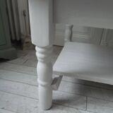 Coffee table with pearl gray patinated base, belt and shelf, wooden top.