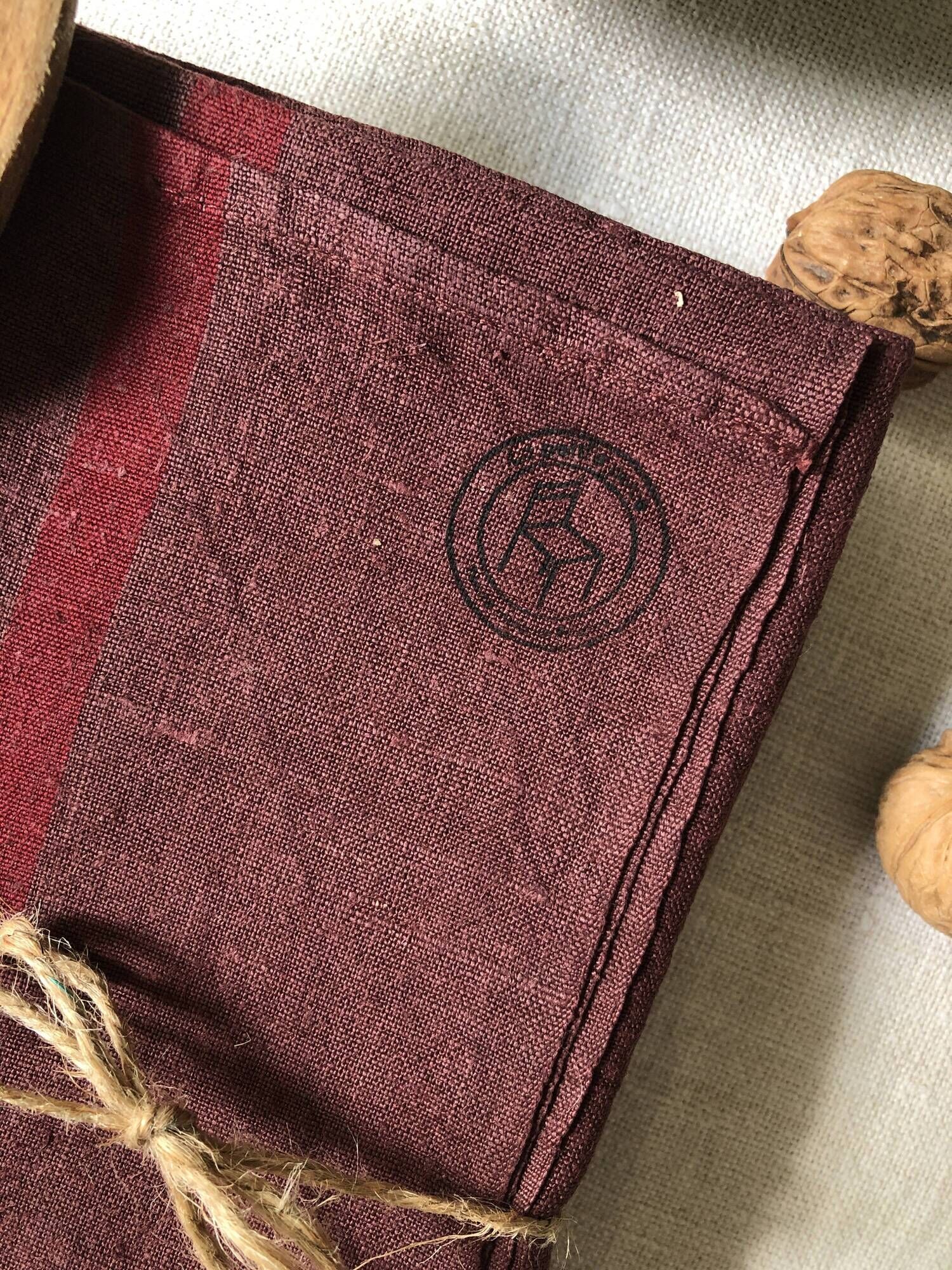 Set of two old tea towels in pure linen tinted in burgundy