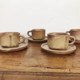 4 sandstone cups with under cups