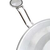 Postmodern chromed metal dining table with a round tempered glass top, italy