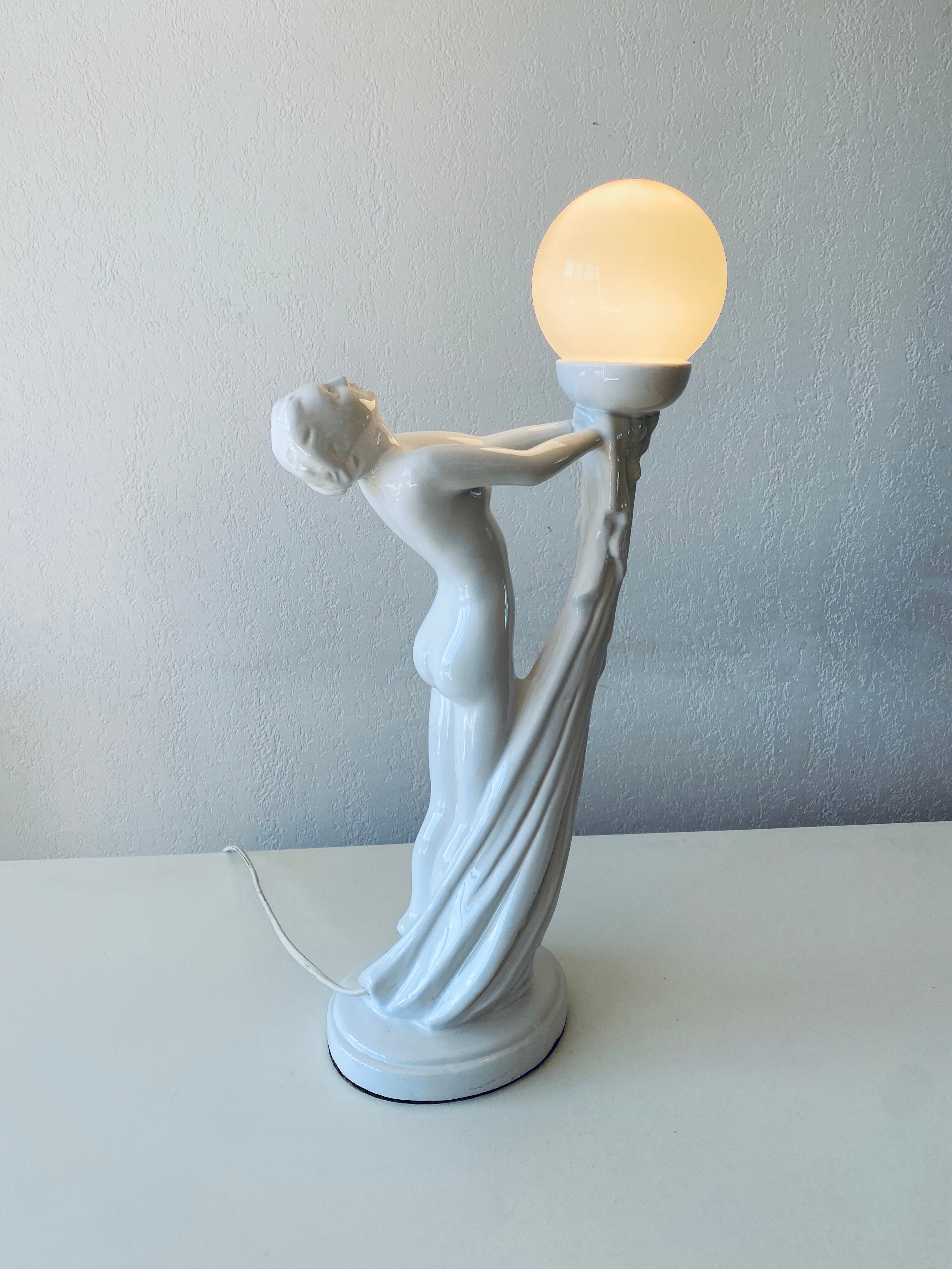 Ceramic naked dancer lamp