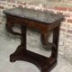 Console era restoration in mahogany veneer with St. Anne marble top.