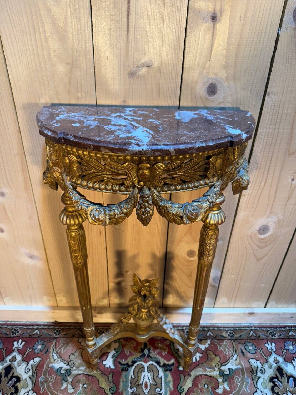 Louis XVI style console in gilded and carved wood