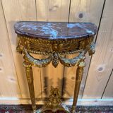 Louis XVI style console in gilded and carved wood