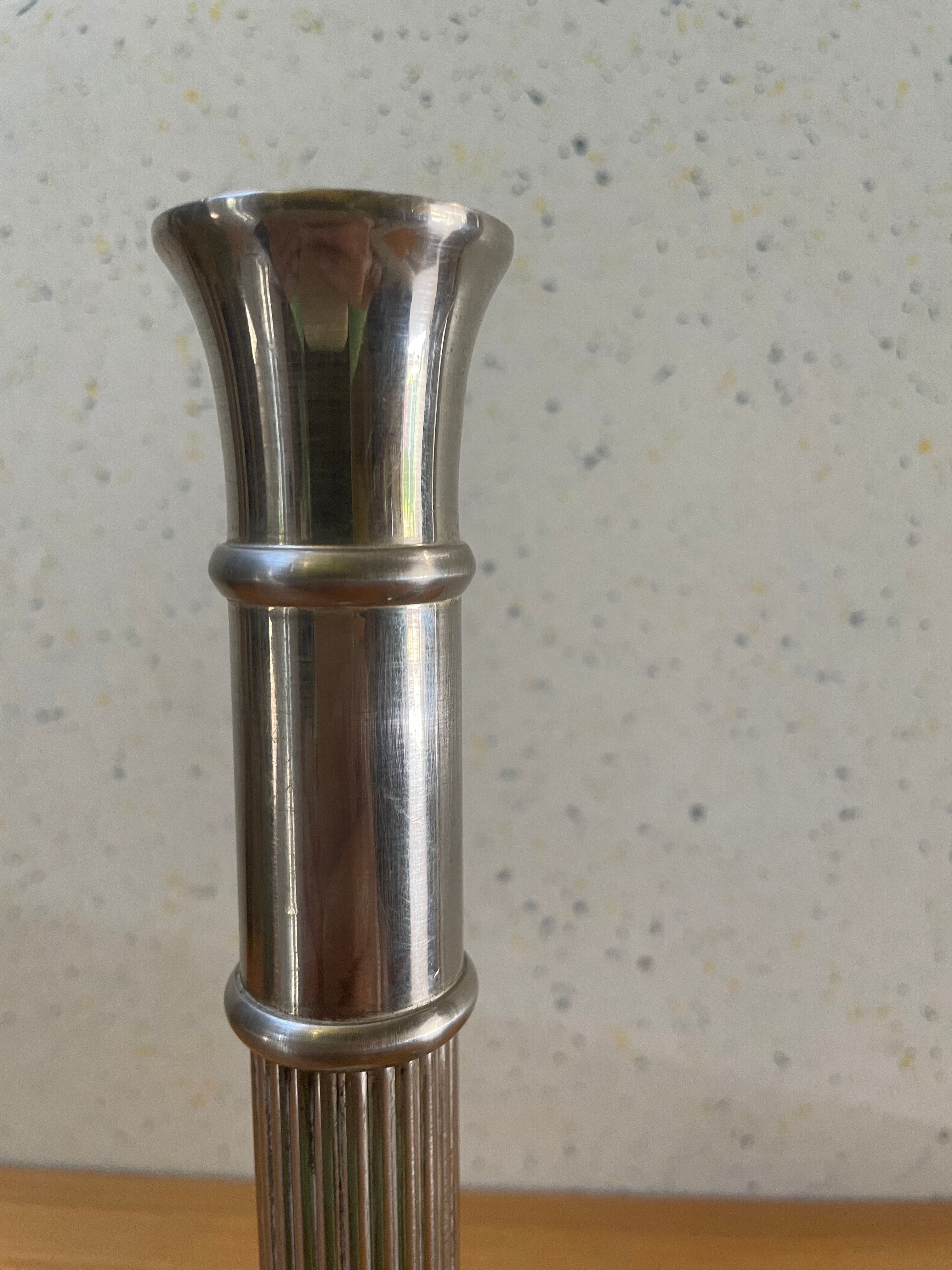 Art Deco candle holders, silver-plated cast iron.