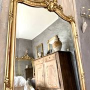 Antique gilded Louis XV pediment mirror