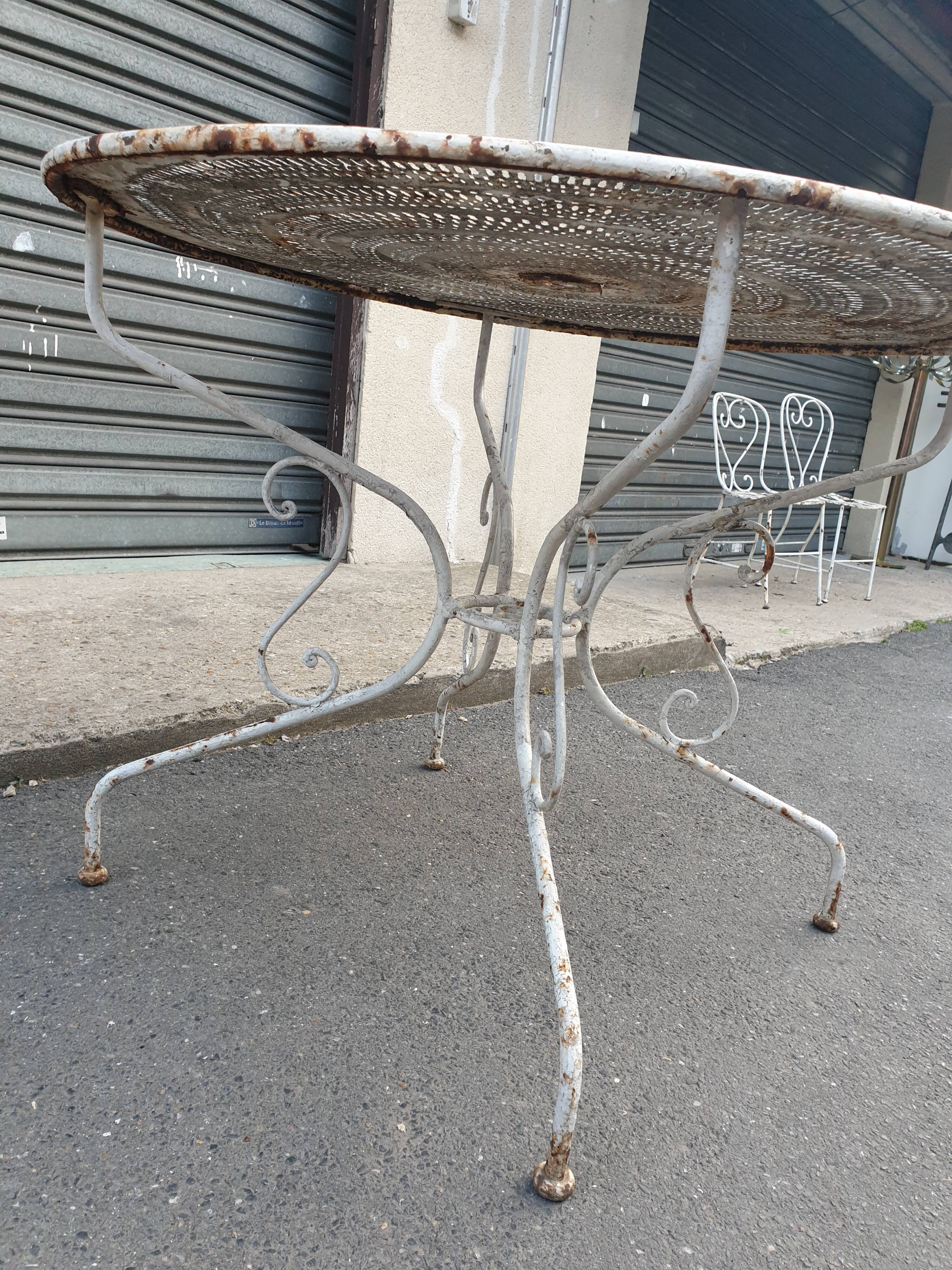 Old wrought iron garden table