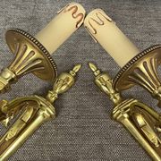 Pair of wall sconces in Louis XVI style. Solid bronze.