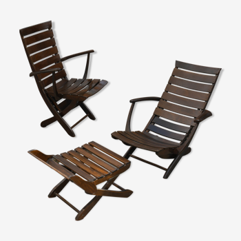Paire de fauteuils Triconfort et ottoman années 50