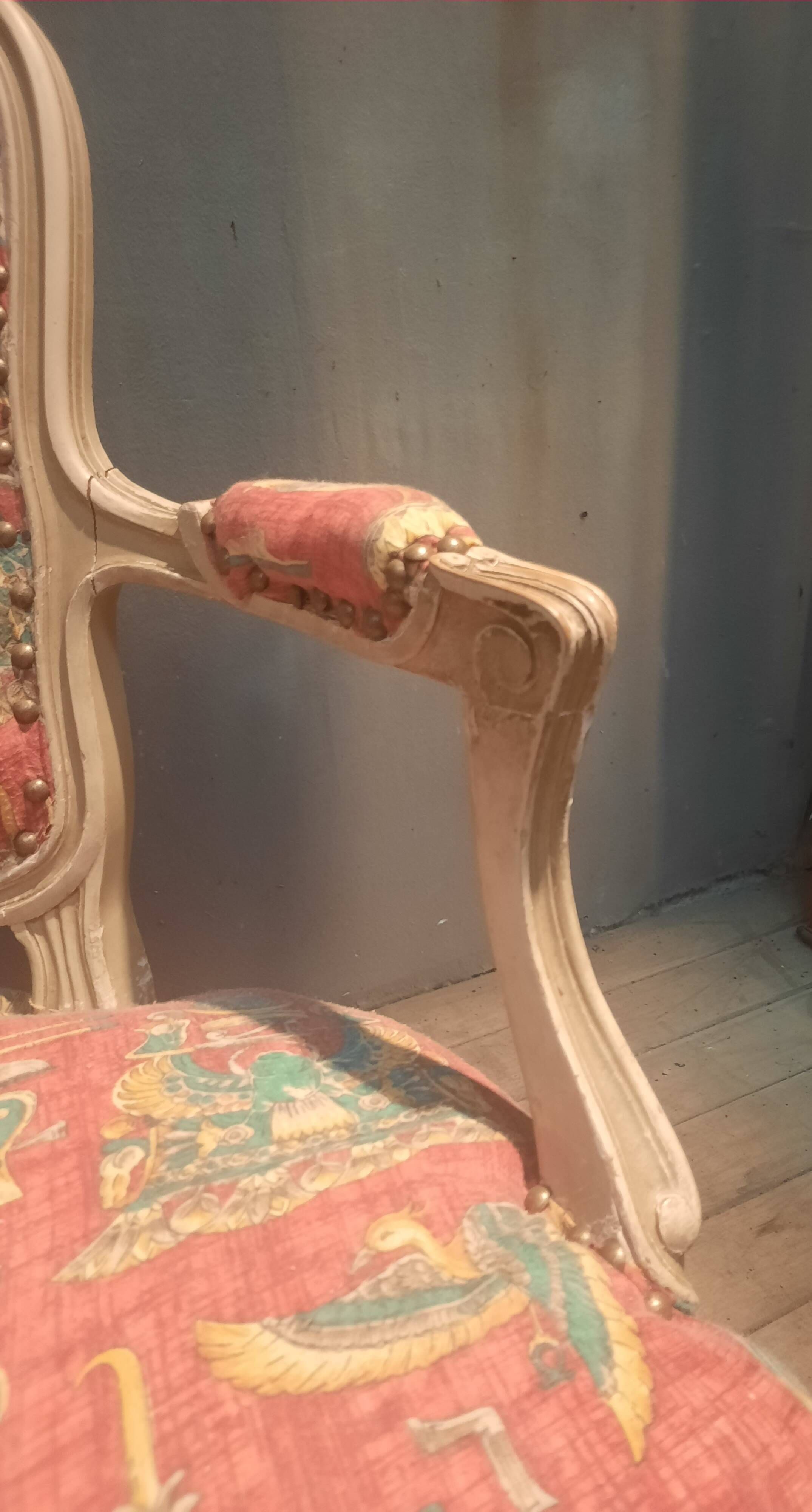 Louis XV style armchair upholstered with an Egyptian pattern.