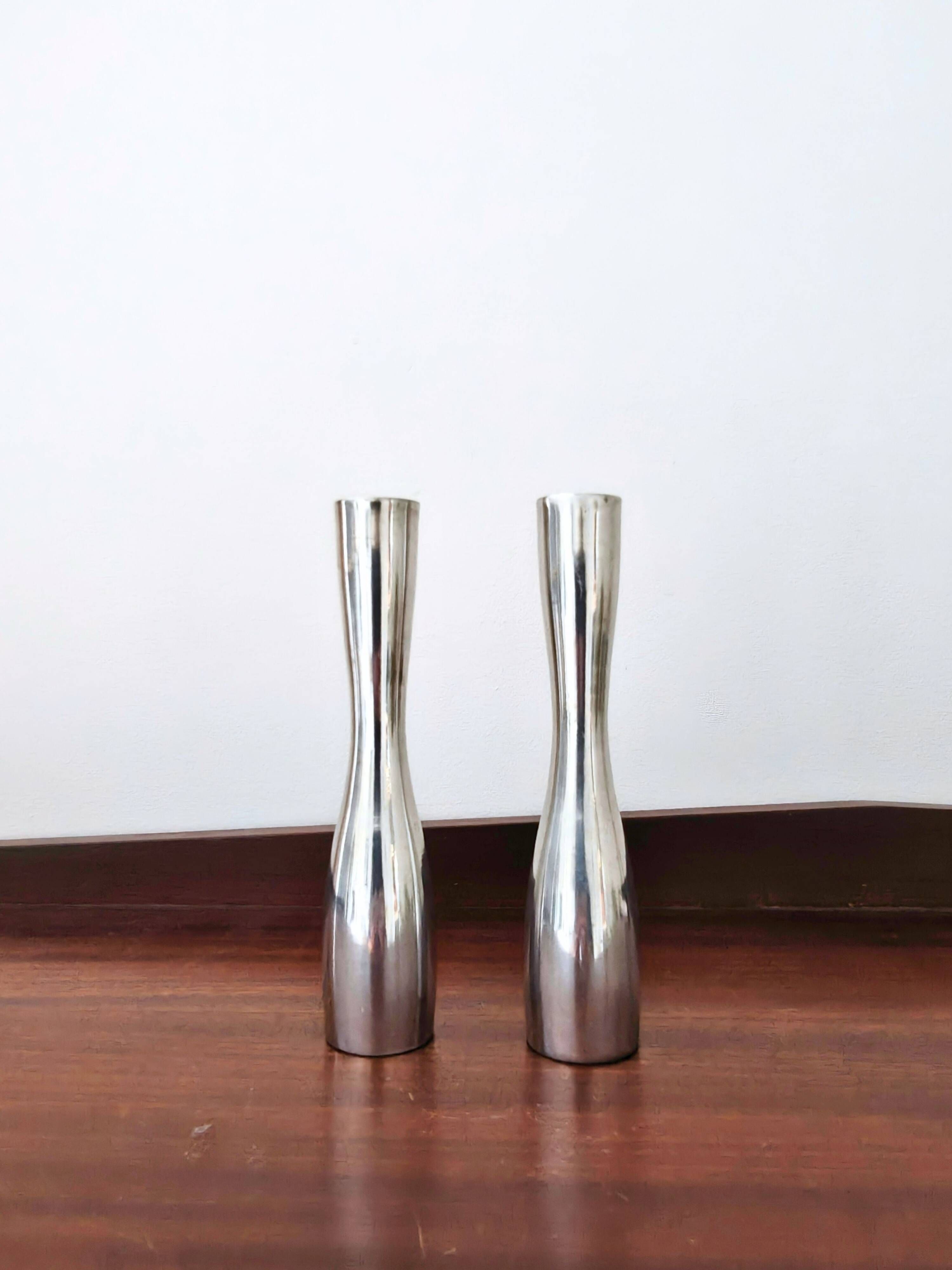 Pair of minimalist aluminium candlesticks in the style of Erika Pekkar.