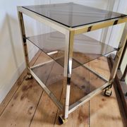 Gold metal and smoked glass serving trolley