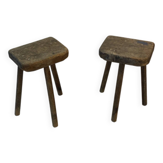 Pair of low wooden farm stools