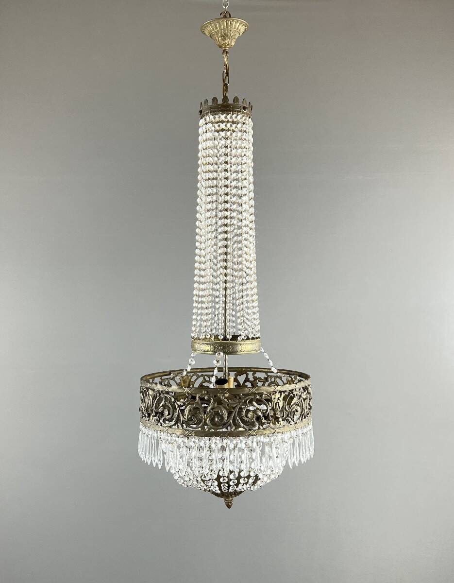 Empire-style chandelier in bronze with crystal pendants, early 20th century.