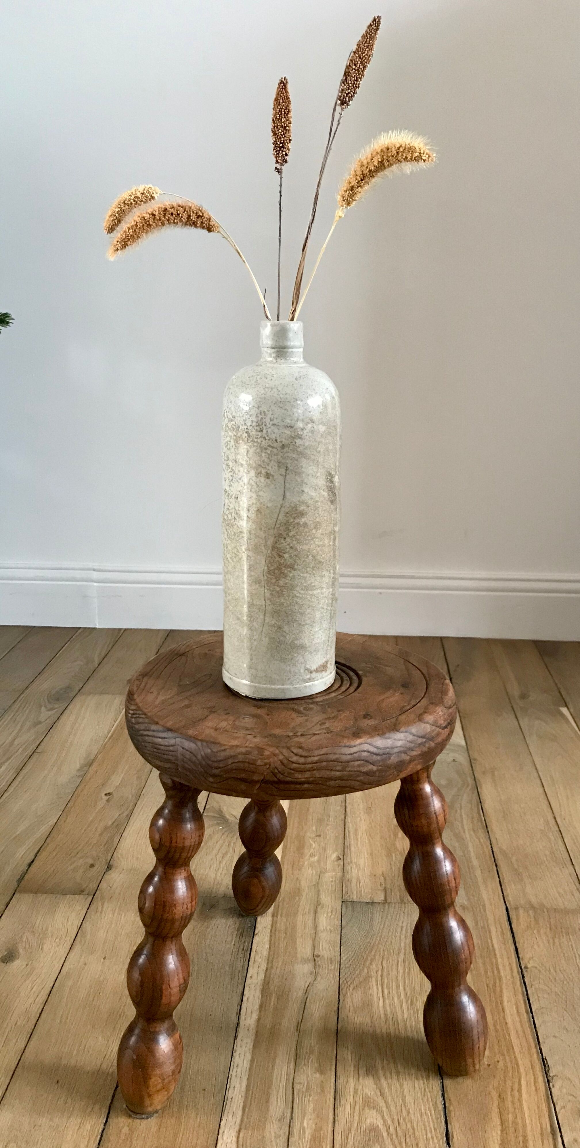 Low wooden stool turned solid 70s