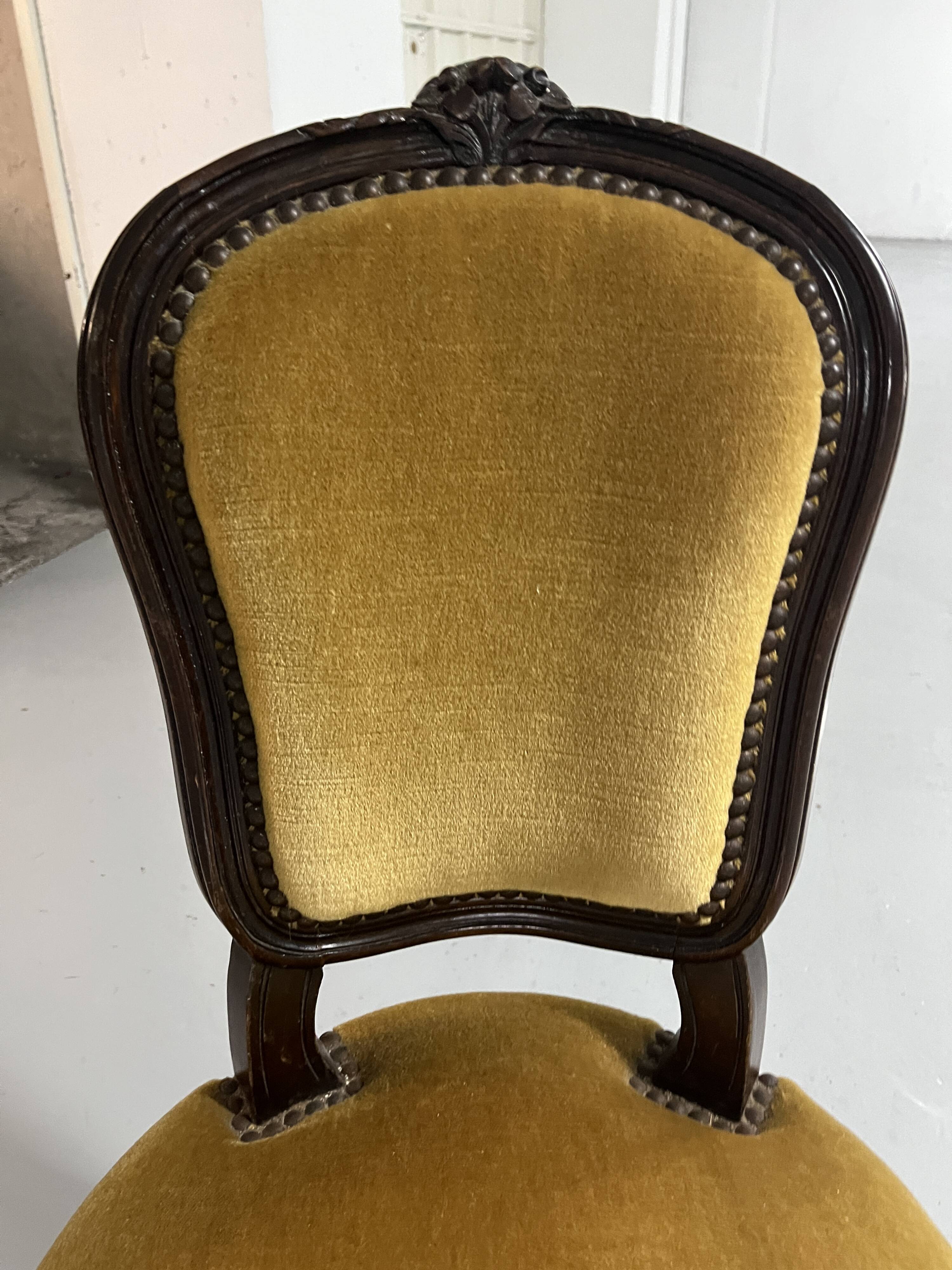 Old-fashioned secretary desk and chair set.