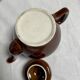 Brown glazed ceramic teapot