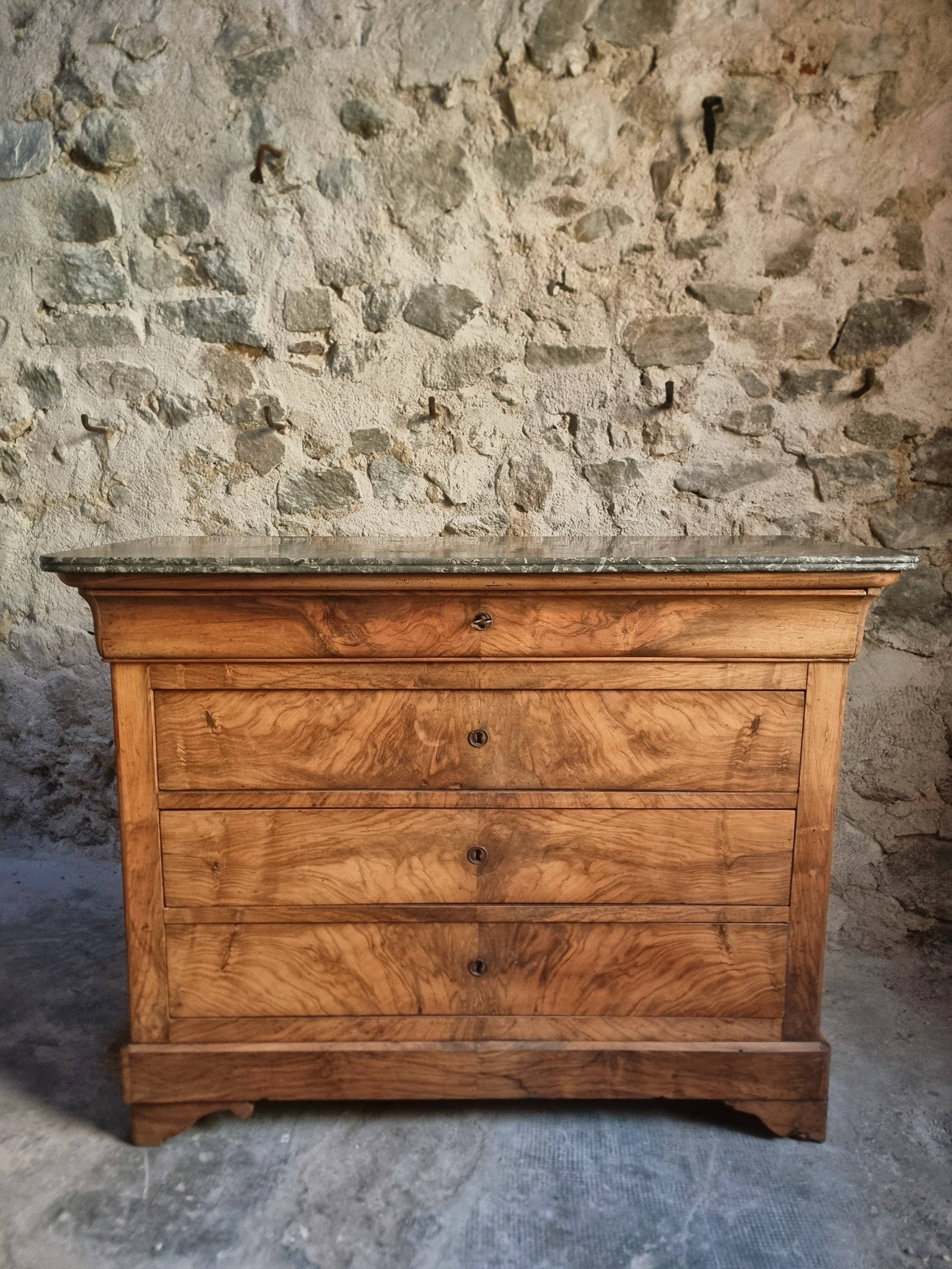 French antique walnut commode with a dark grey marble top, circa 1830–1860.