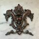 Vintage small furniture ornament in copper alloy with fish decoration.