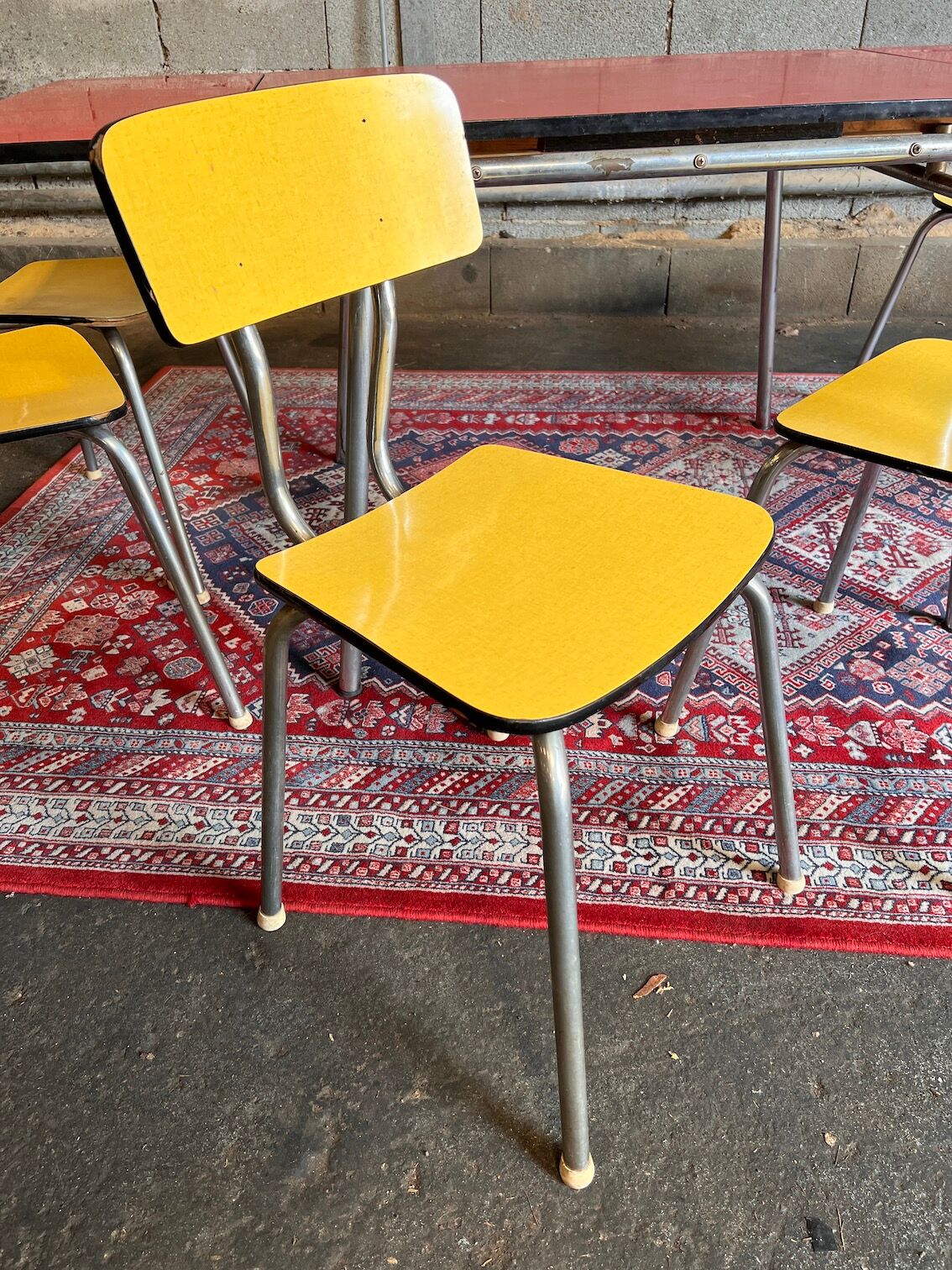 Red table set and 6 vintage yellow formica chairs