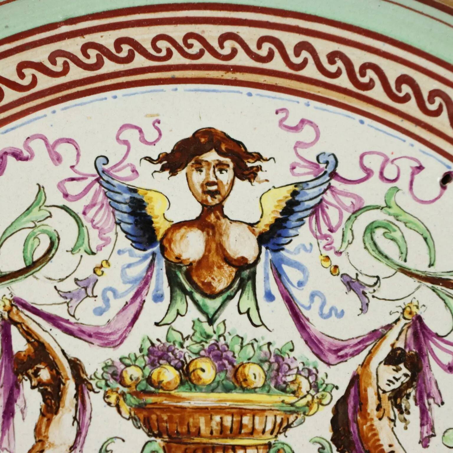 Antique majolica plate decorated with fruits, Italy, 20th century.