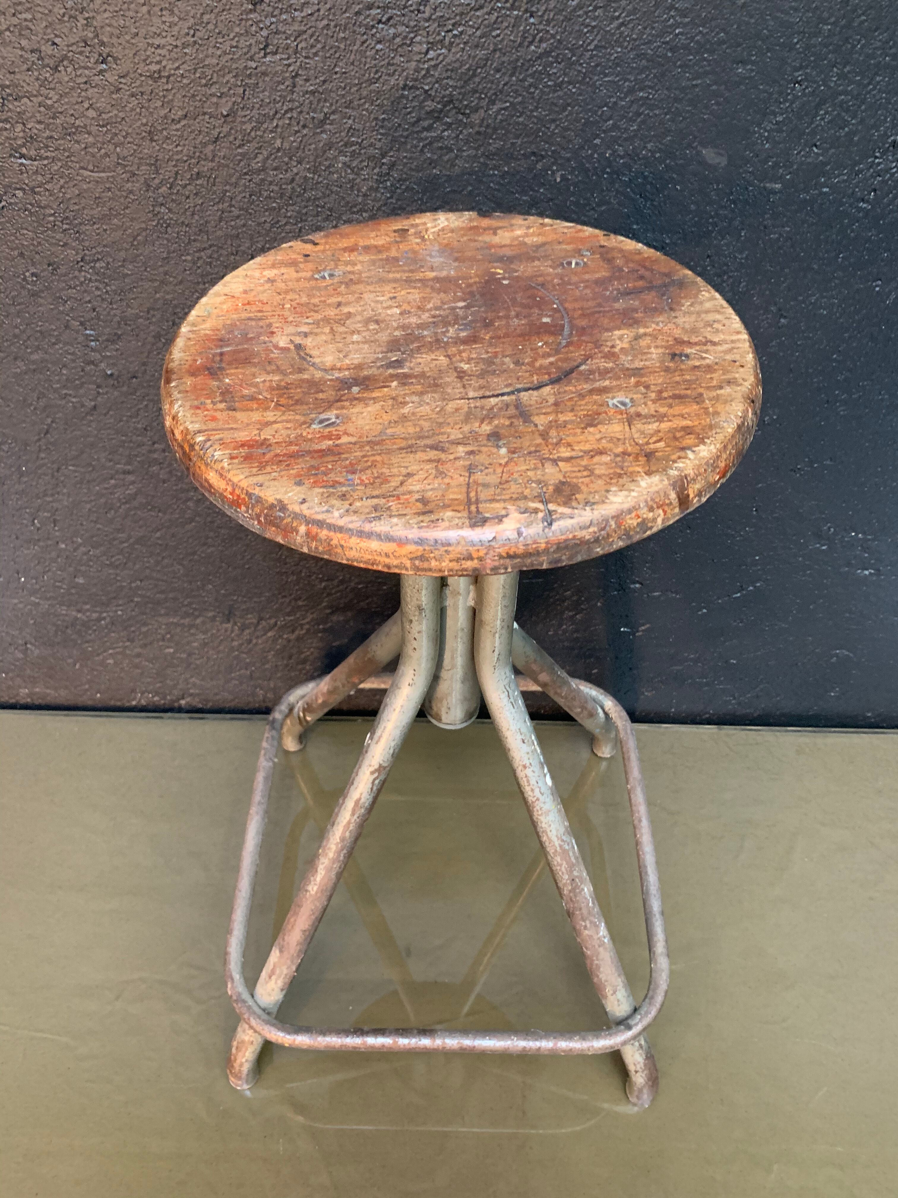 Old adjustable workshop stool