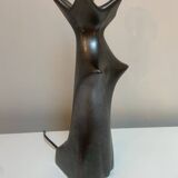 Black glazed ceramic lamp in the shape of a woman attributed to Jacques Bli