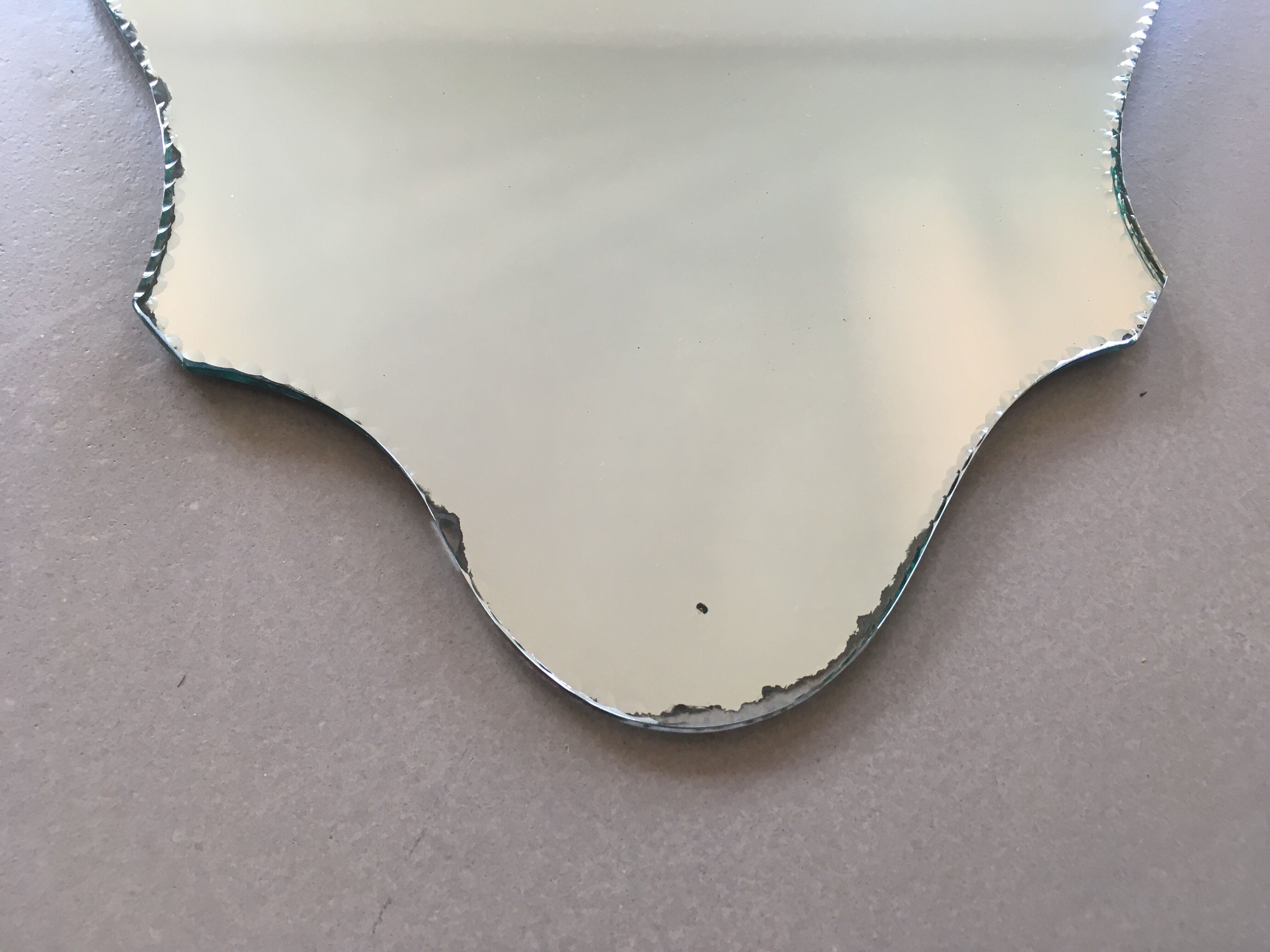 Old bevelled/chiseled mirror 39x57cm