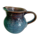 Pitcher in enamelled blue sandstone