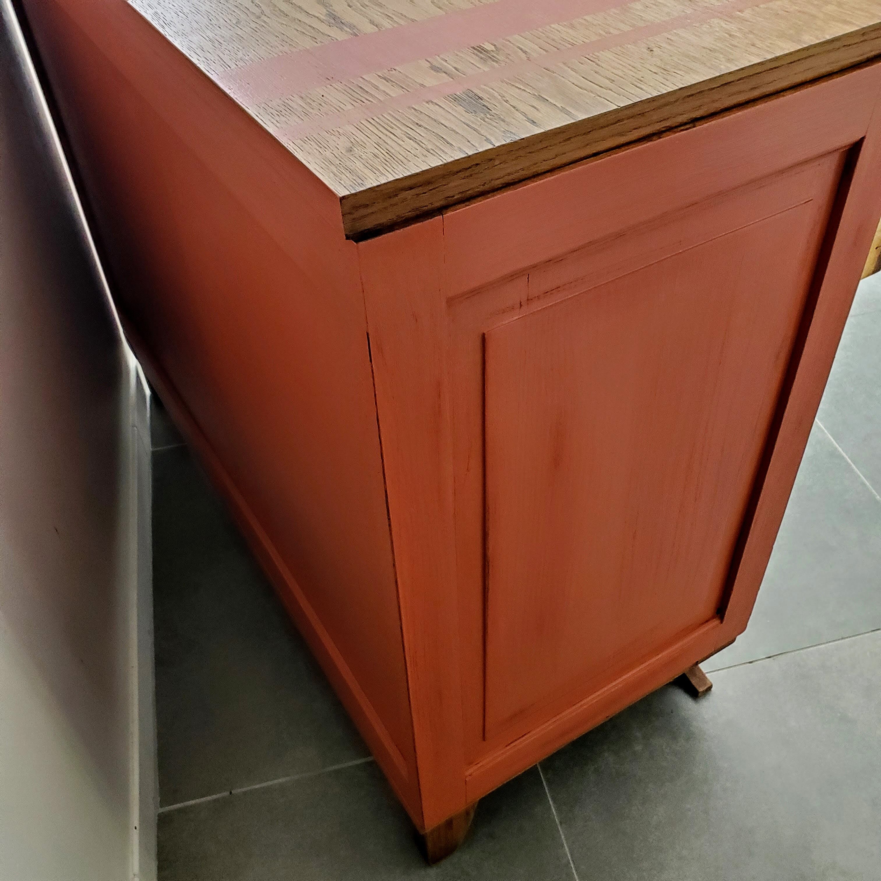 Terracotta patina oak chest of drawers