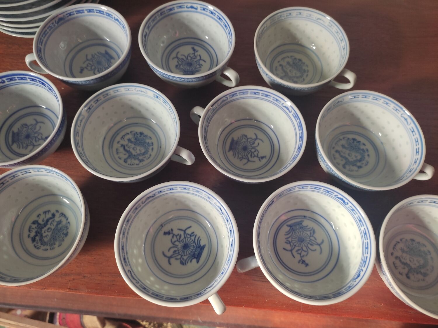 11 cups and saucers in vintage Chinese porcelain