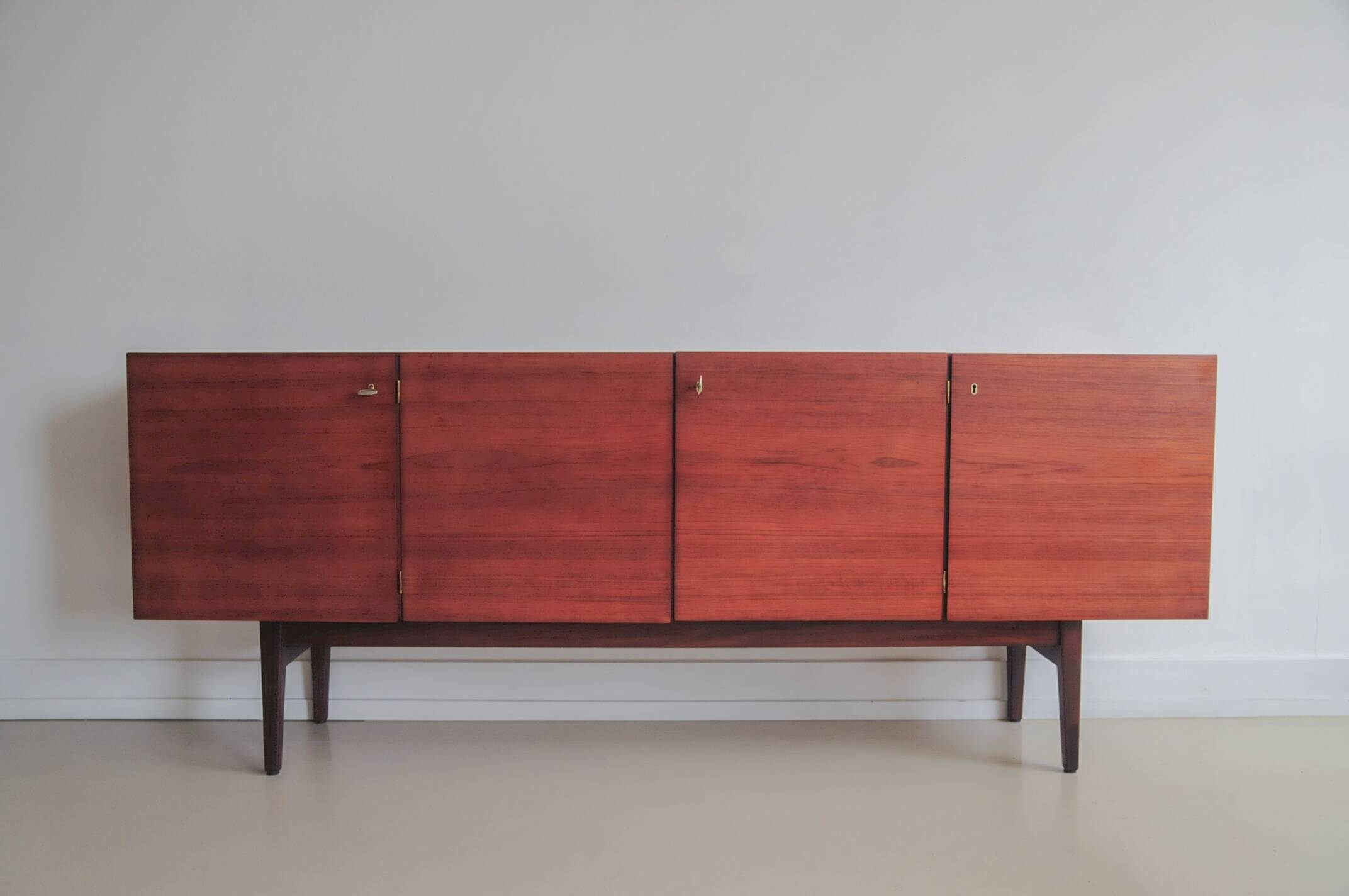 vintage Danish sideboard with black and white drawers