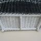 Black and white rattan magazine door