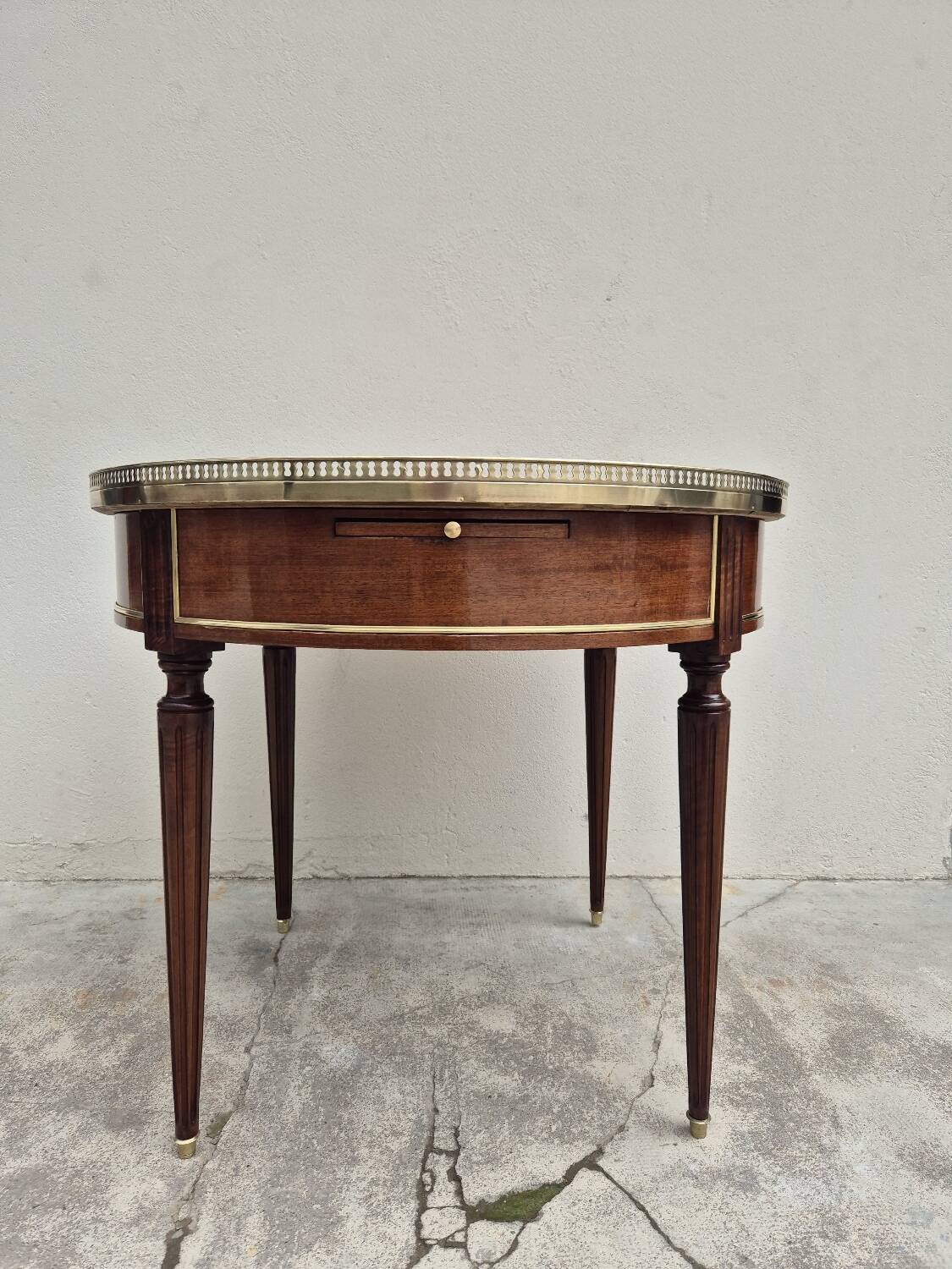 Louis XVI style mahogany bouillotte table in marquetry and bronze