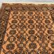 Old faded terracotta rug | Turkmen tribal wool rug