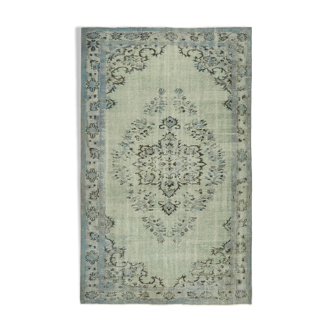 Handmade distressed anatolian 1980s 169 cm x 269 cm blue rug