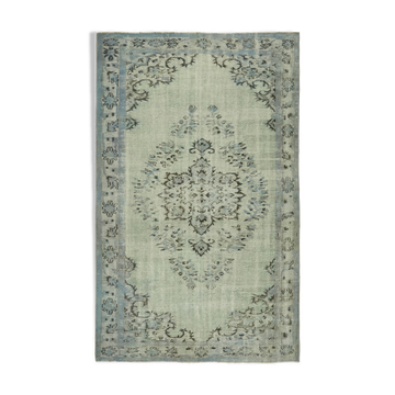Handmade distressed anatolian 1980s 169 cm x 269 cm blue rug