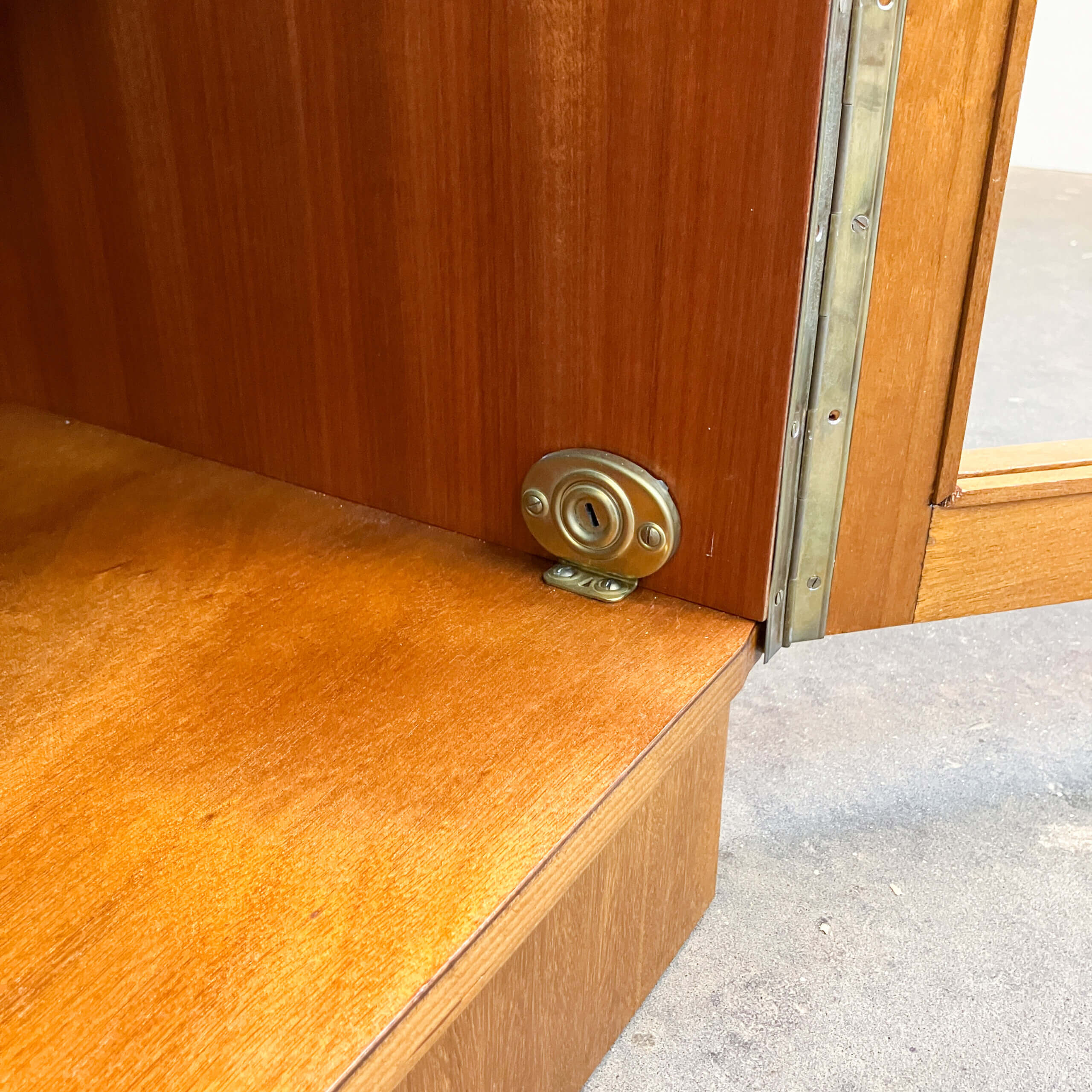 Art Deco cabinet with glass doors, various woods, 1930s