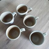 5 cups and saucers in marsh sandstone