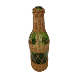 Green bottle with wicker decoration