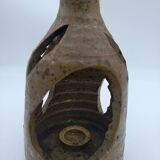 Stoneware candle holder.