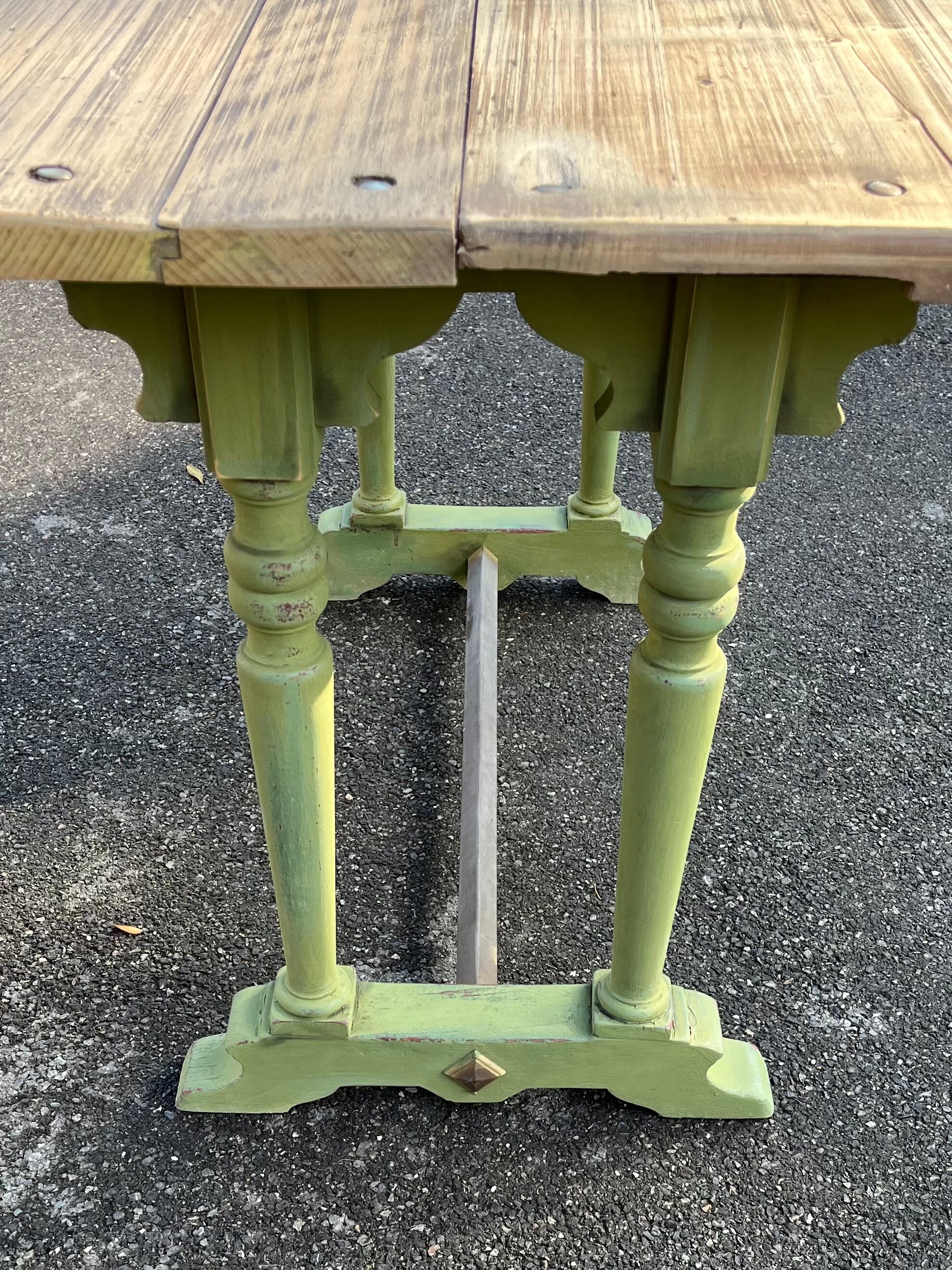Old table patinated green legs