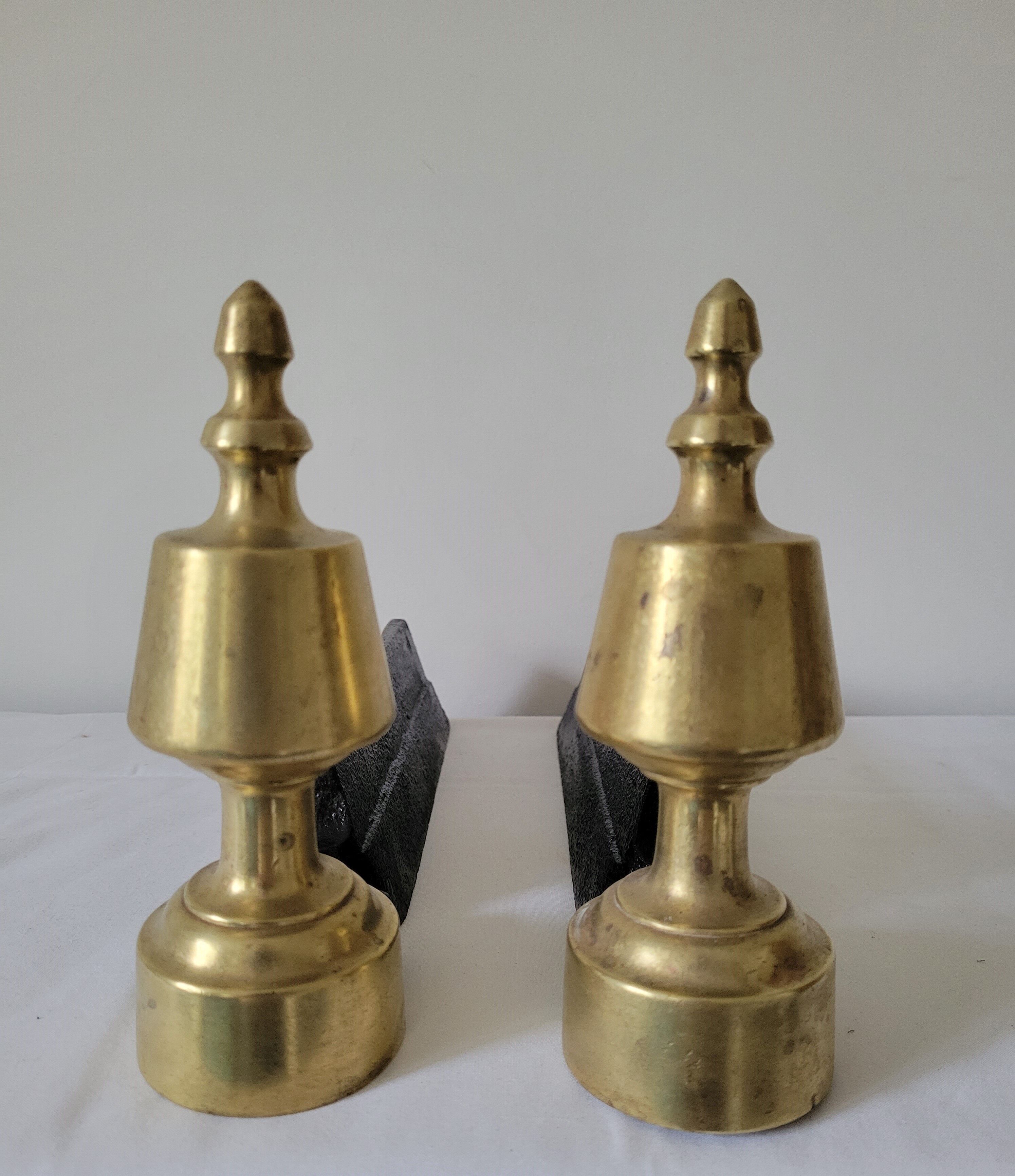 Paire de chenets en fonte et laiton