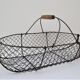 Two baskets metal and patinated wood early twentieth century