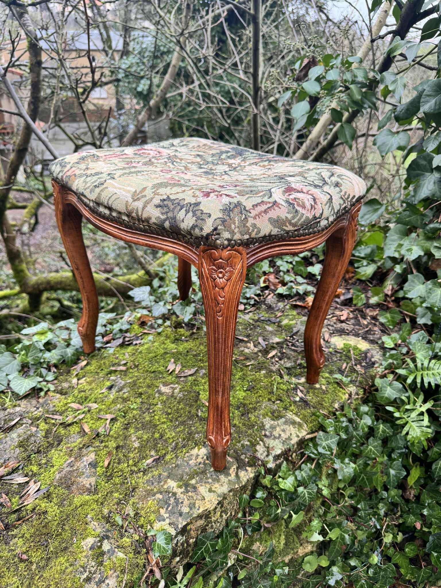 Large antique footrest in the Louis XV style.