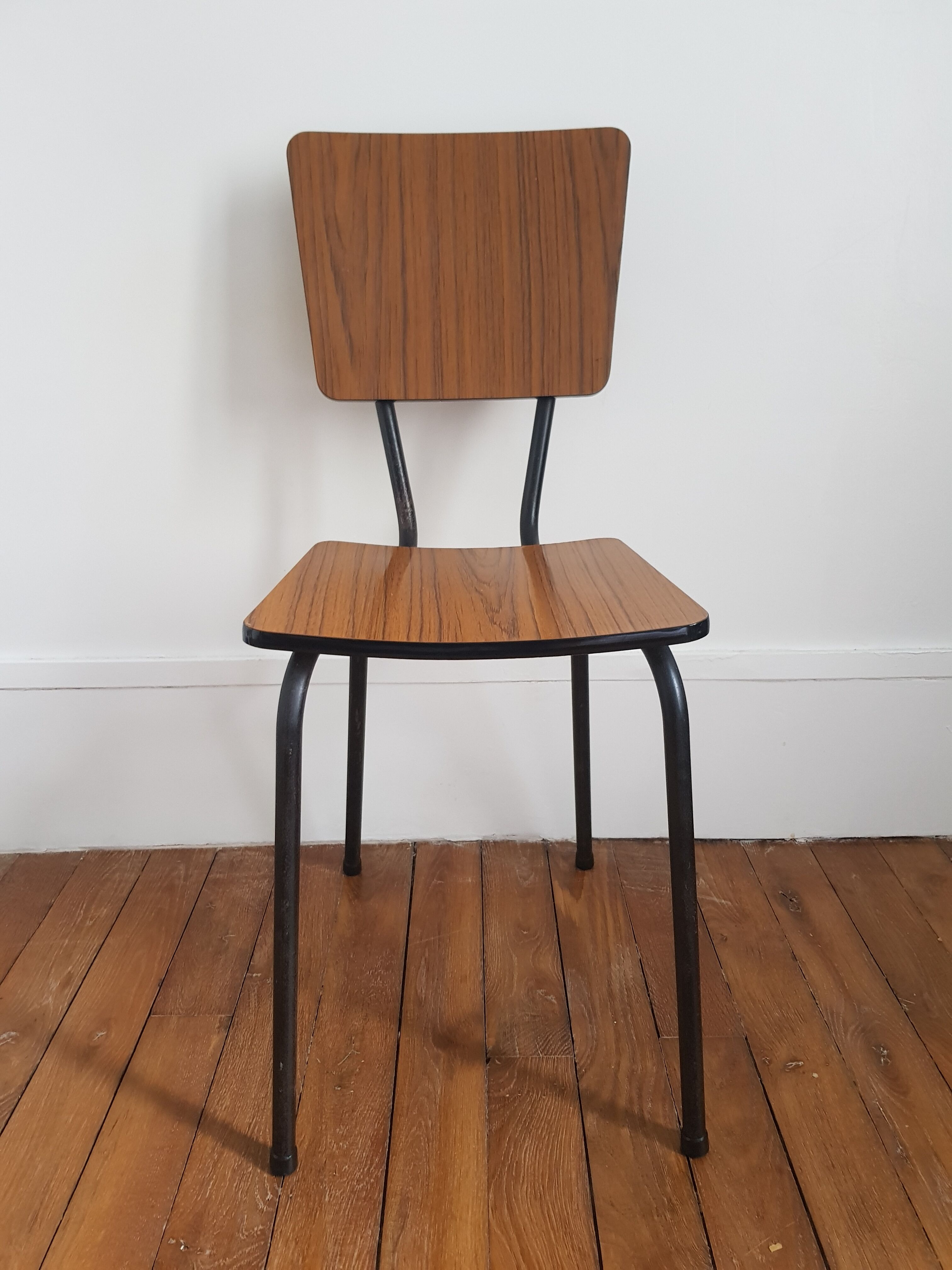 Brown formica chair with black structure