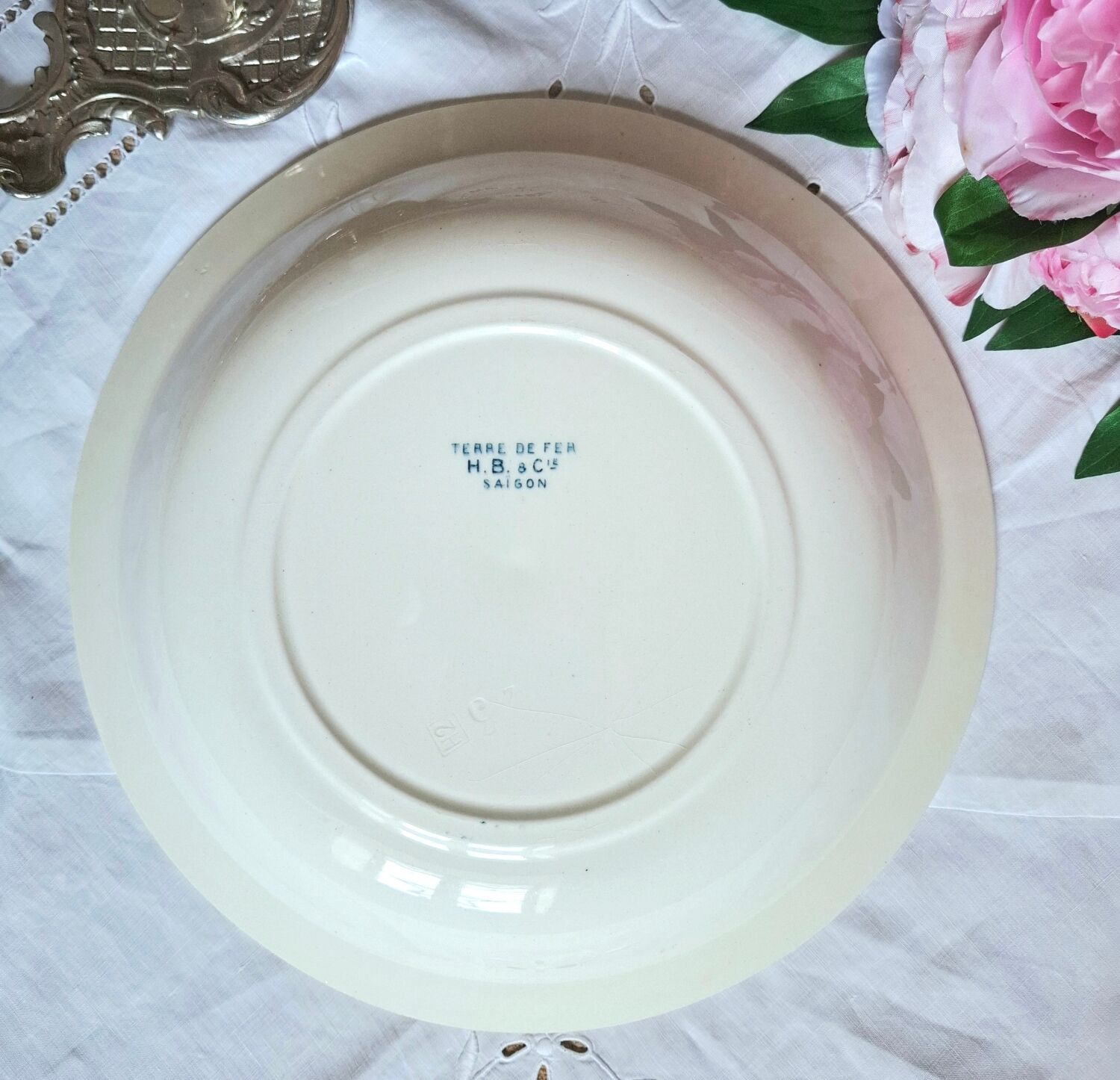 Mismatched antique flat plates made of ironstone accompanied by